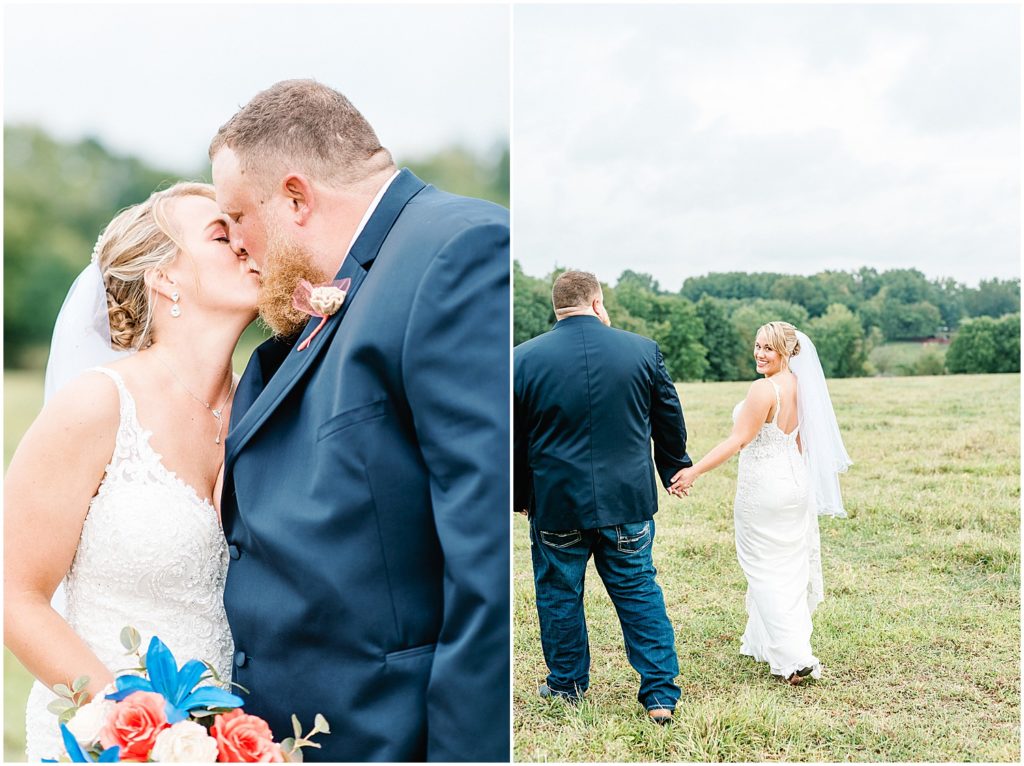 bride and groom kissing and walking in field during portraits on wedding day