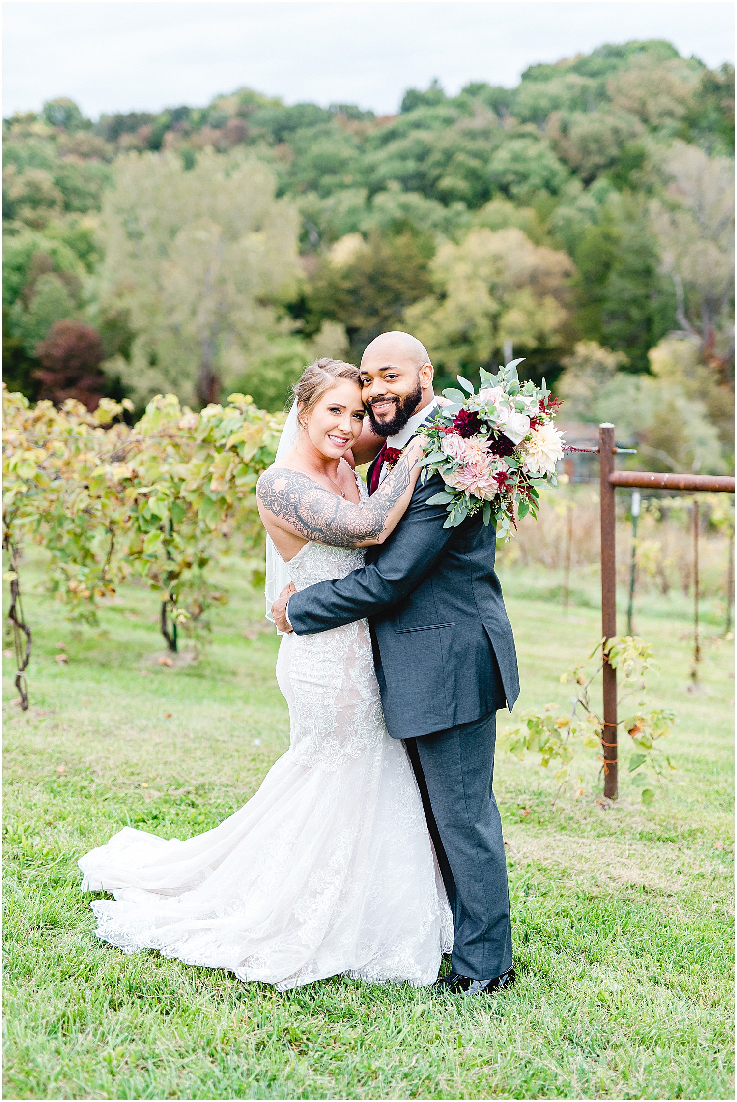 bride and groom smile during portraits at Canterbury hill winery wedding