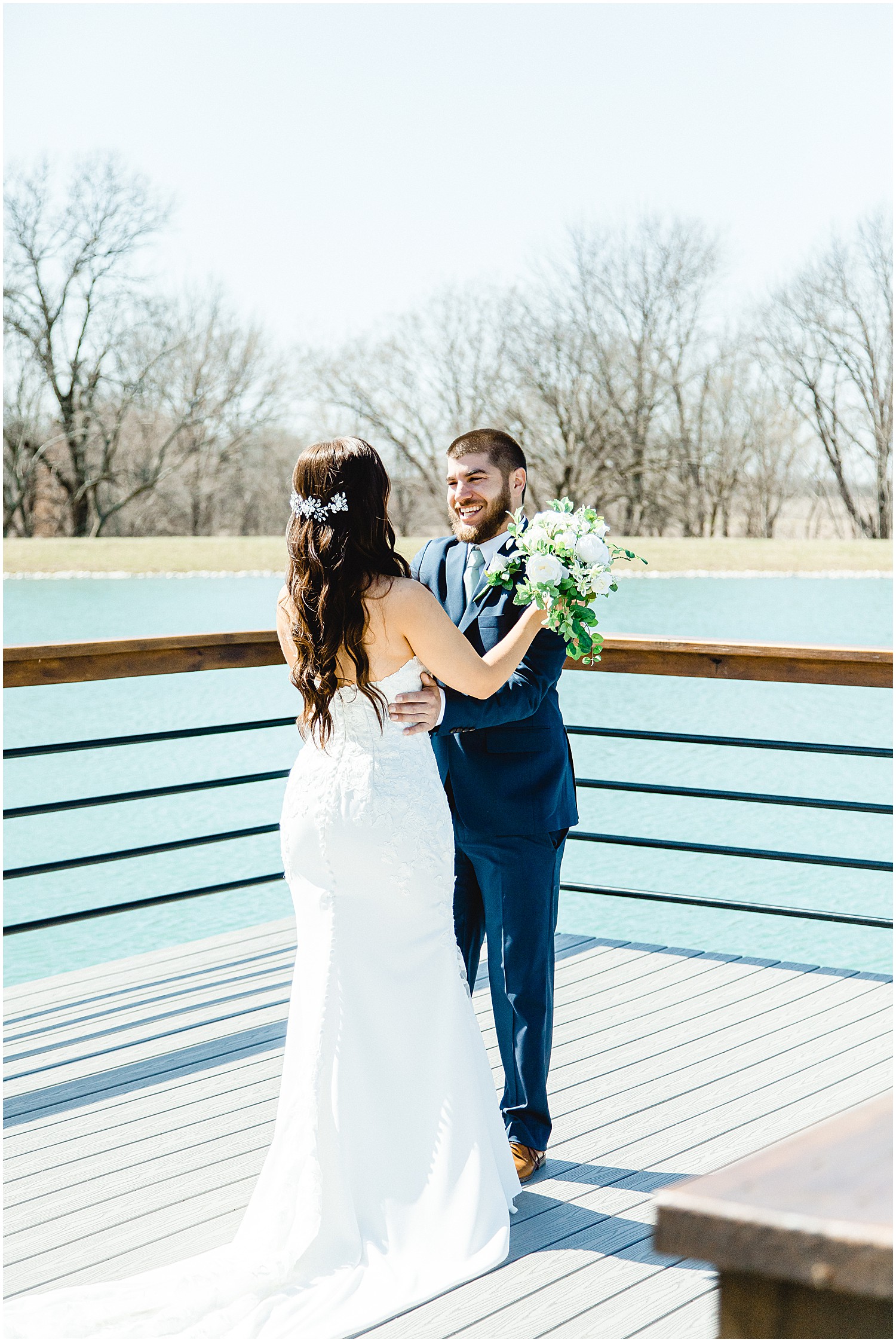 First look with bride and groom on the dock at Emerson Fields missouri wedding venue