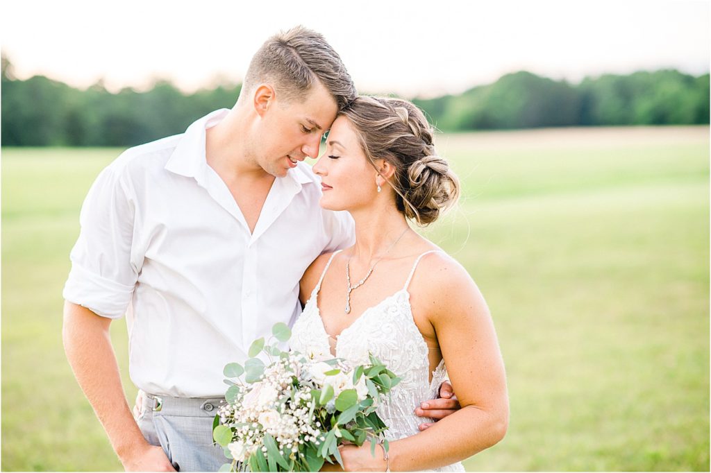 bride and groom sunset photos outside sweet clover farms wedding venue